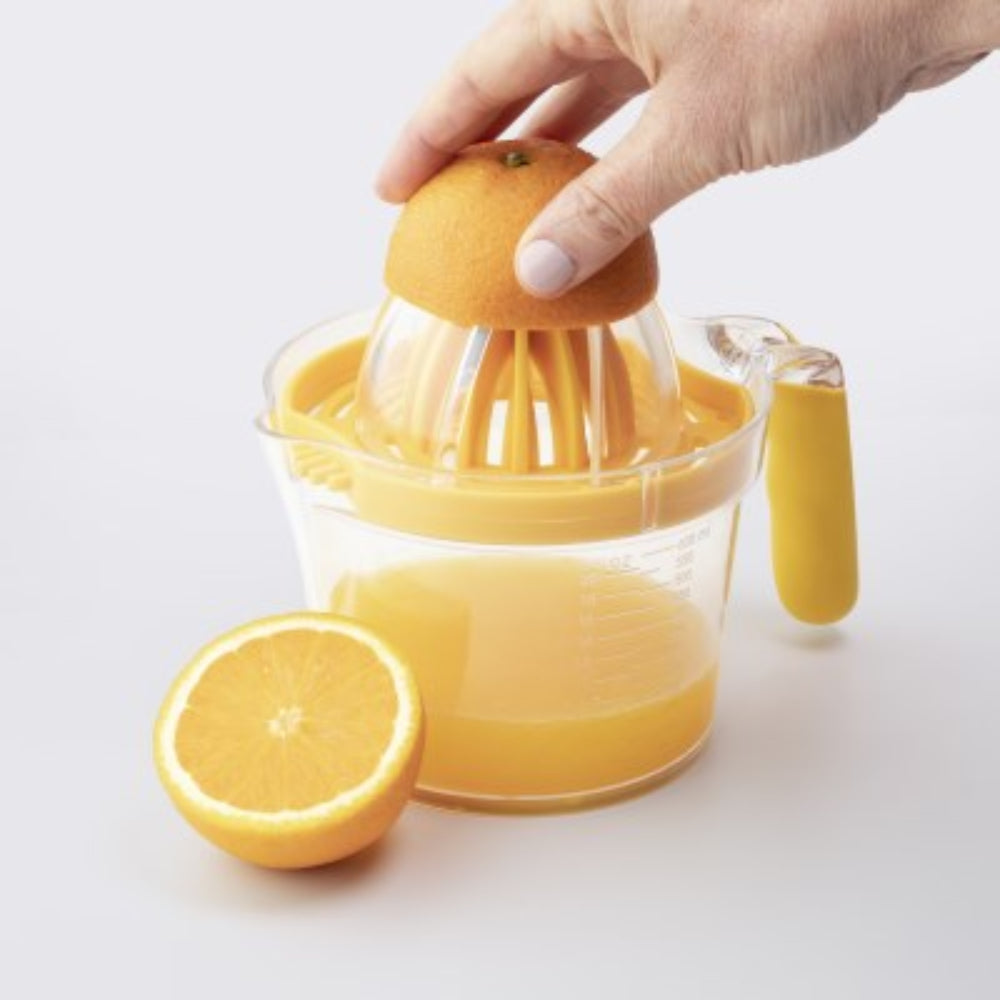 lemons on citrus reamer on multi function measuring jug