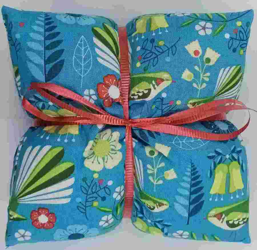 fantail on blue patterned wheatbag
